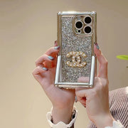 Fashion CC Sparkling powder invisible bracket phone case for iPhone