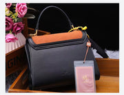 New fashion Retro contrasting colors cowhide Handbag