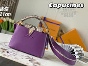 Purple python pattern handbag