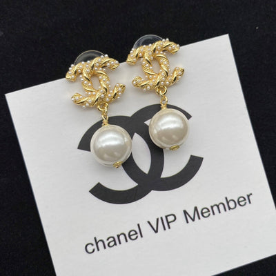 Gold pearl earrings