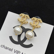 Gold pearl earrings