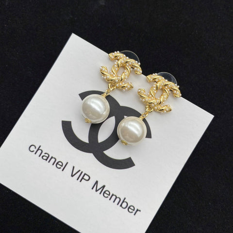 Gold pearl earrings