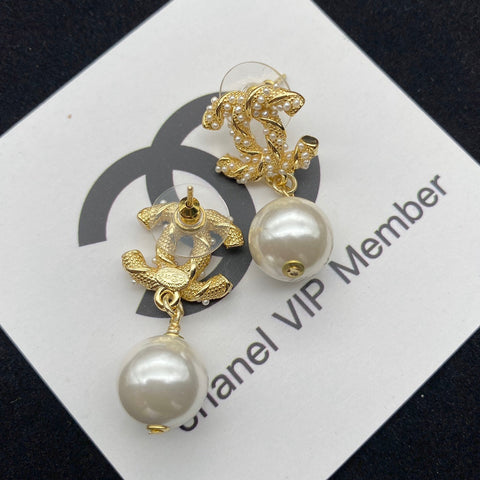 Gold pearl earrings