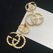 Unisex gold earrings