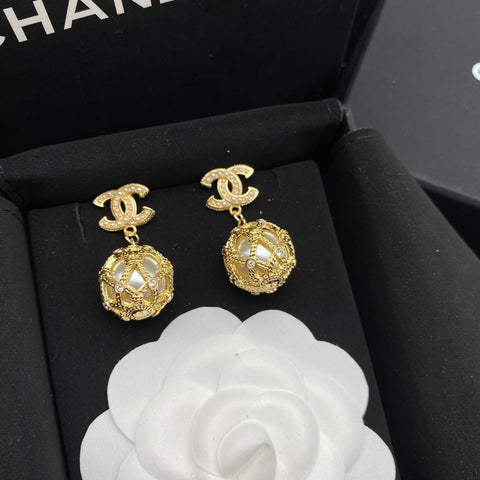 Gold pearl earrings