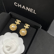 Gold pearl earrings