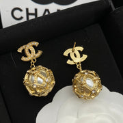 Gold pearl earrings