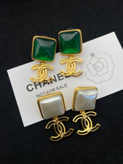 Green and white gem earrings