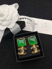 Green and white gem earrings