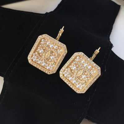 Gloden peral earrings