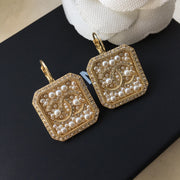 Gloden peral earrings