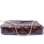 Pallas Clutch Monogram