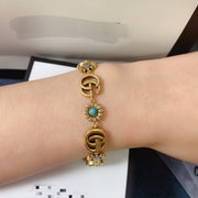 Gold letter bracelet