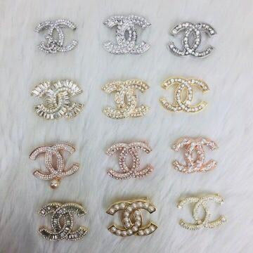 Chanel brooches