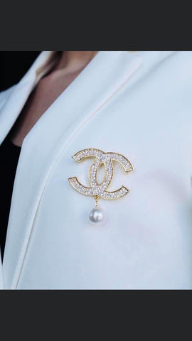 Chanel brooches