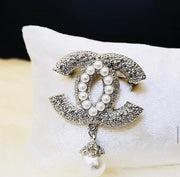 Chanel brooches