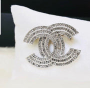 Chanel brooches