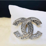 Chanel brooches