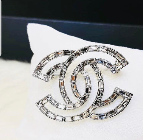 Chanel brooches