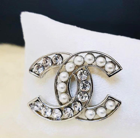 Chanel brooches