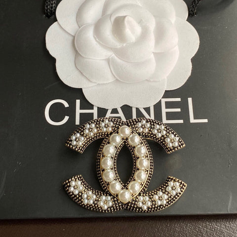 C h brooch