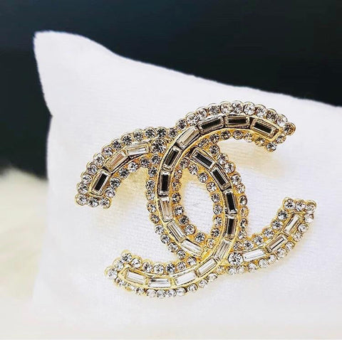 Chanel brooches