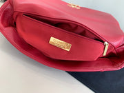 C red handbag