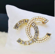 Chanel brooches