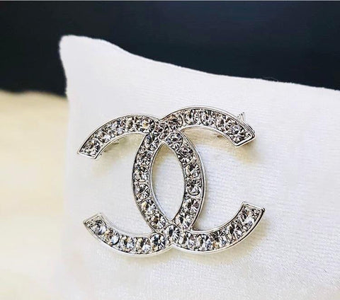 Chanel brooches