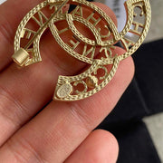 C h  brooch