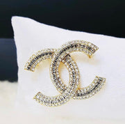 Chanel brooches