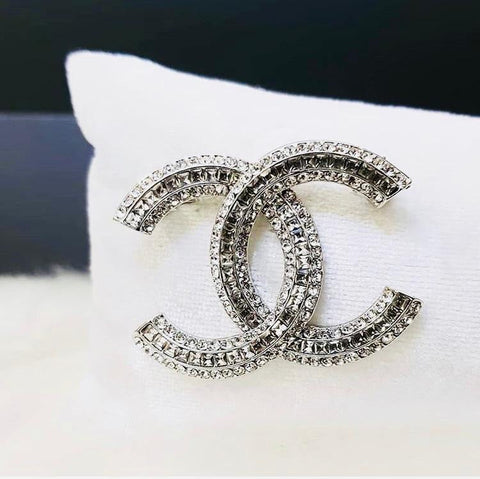 Chanel brooches