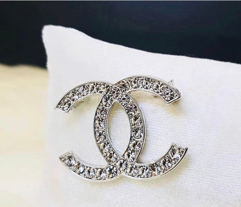 Chanel brooches