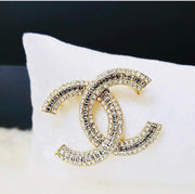 Chanel brooches